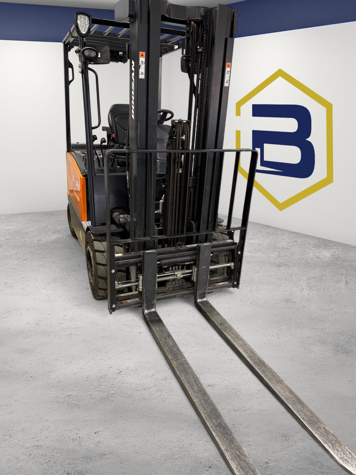 Burwell Material Handling 2022 Doosan B25X-7 electric sit-down forklift with orange chassis in a warehouse setting