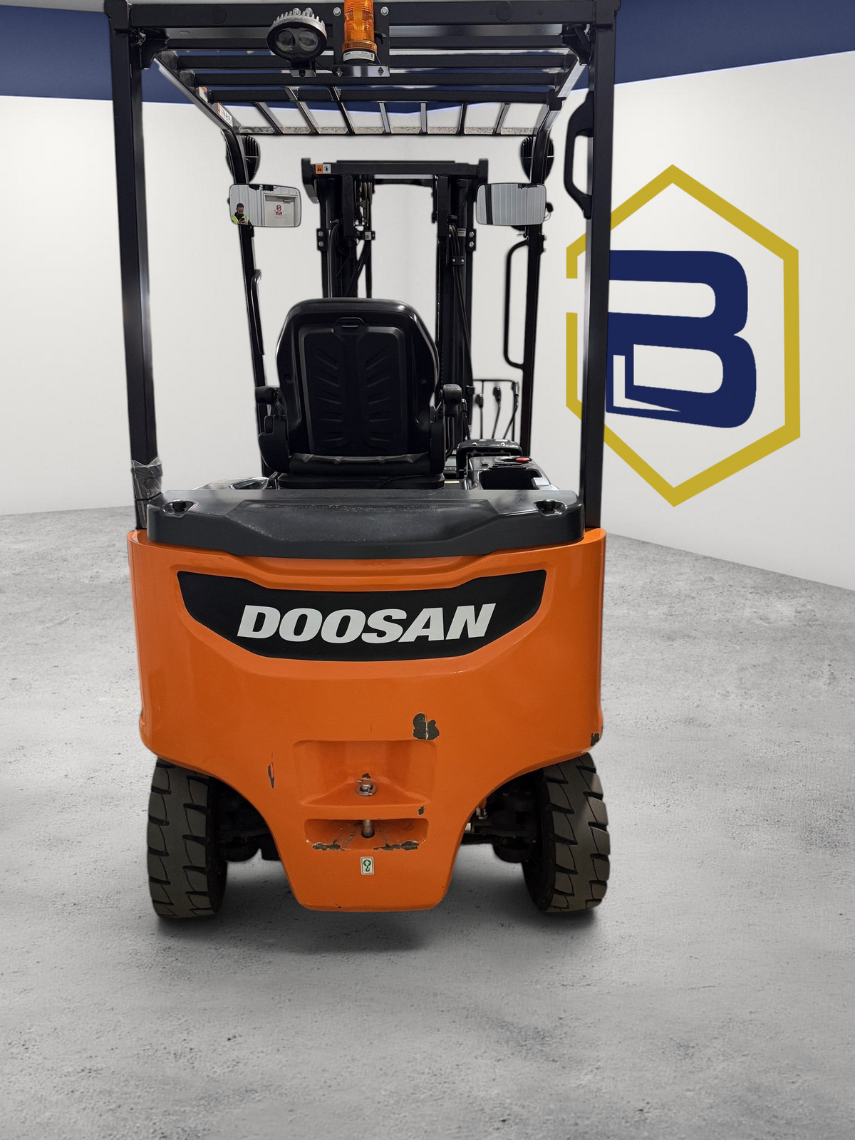 Rear view of a 2022 Burwell Material Handling Doosan B25X-7 electric sit-down forklift in a warehouse.