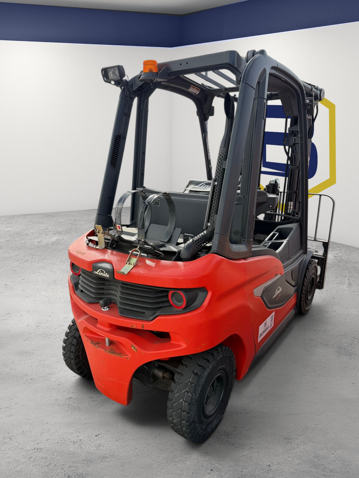 Burwell Material Handling 2021 Linde H25T red LP forklift with ergonomic controls parked in an outdoor equipment yard.