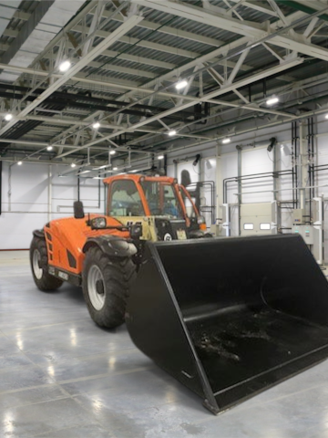 Burwell Material Handling 2023 JLG AG823 telehandler with enclosed cab and large black bucket in warehouse