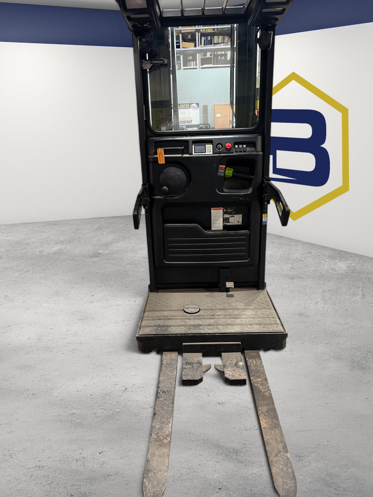Burwell Material Handling 2019 Clark OSX15 electric order picker with stand-on platform in a warehouse setting.