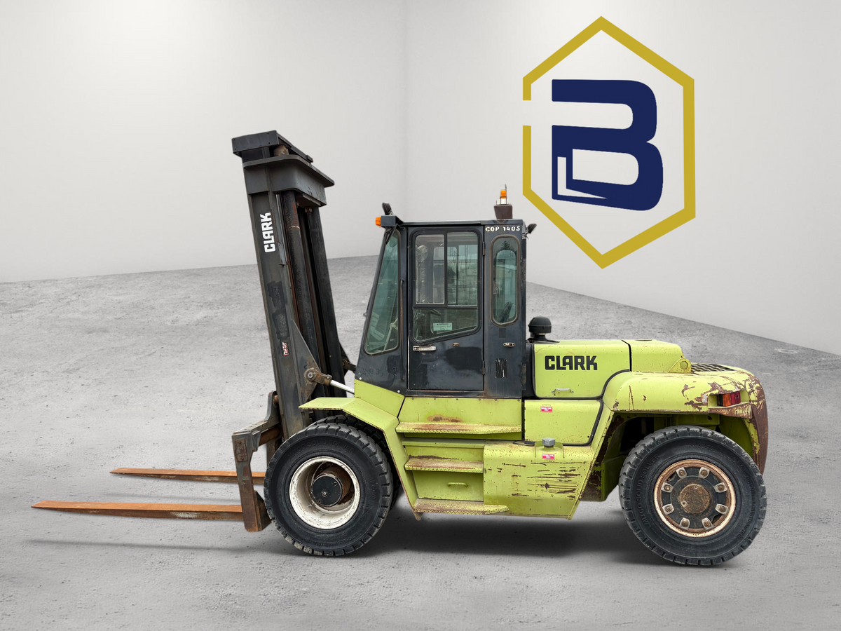 Burwell Material Handling 2000 Clark CDP140S diesel pneumatic forklift parked outside a warehouse facility.