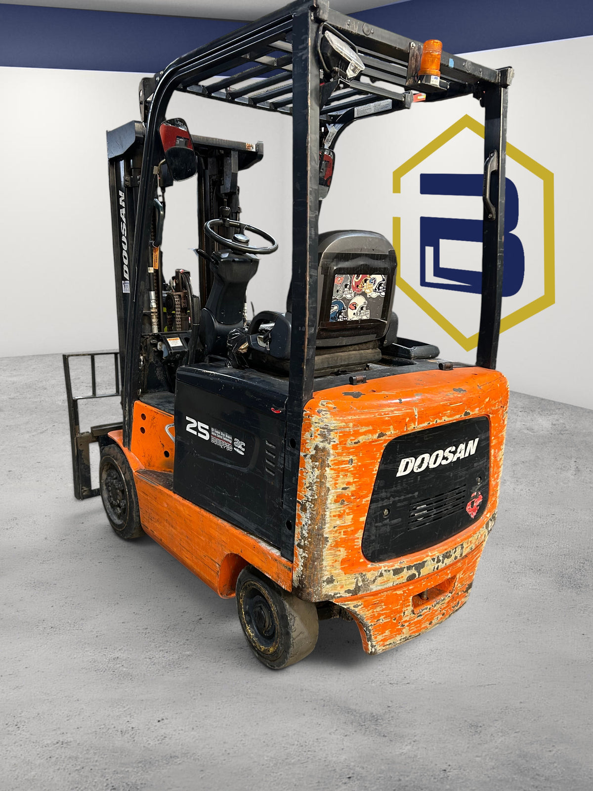 Burwell Material Handling 2000 Doosan BC25S-5 electric sit-down forklift with orange and black finish