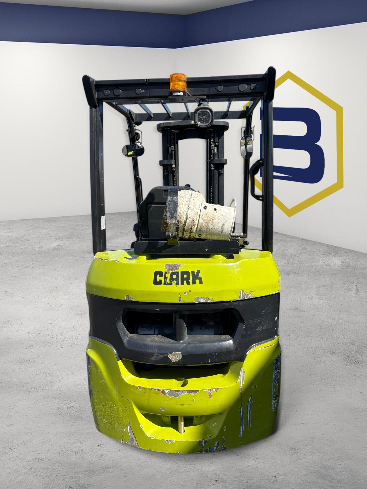 Burwell Material Handling 2020 CLARK S25C LPG cushion-tire forklift in lime green, viewed from the rear in a parking lot.