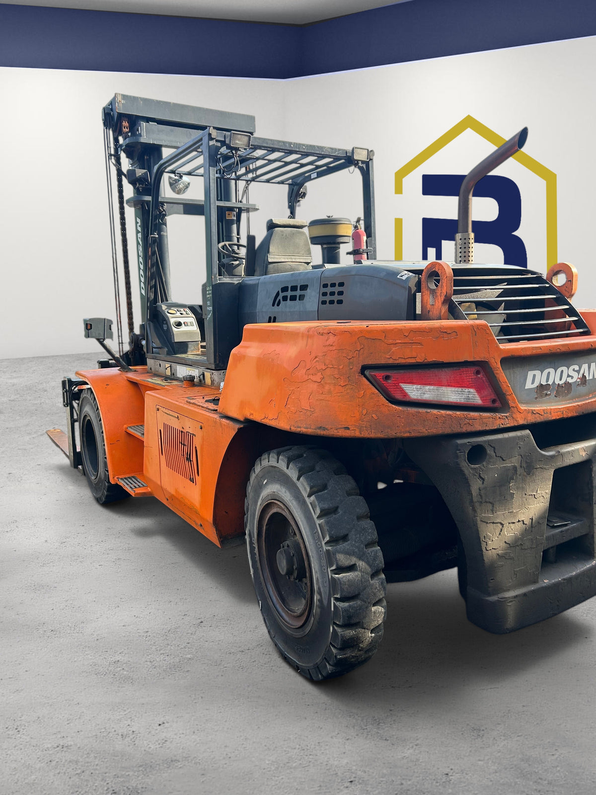 Burwell Material Handling used orange Doosan D140S-7 heavy-duty diesel forklift with enclosed cab in an outdoor yard.