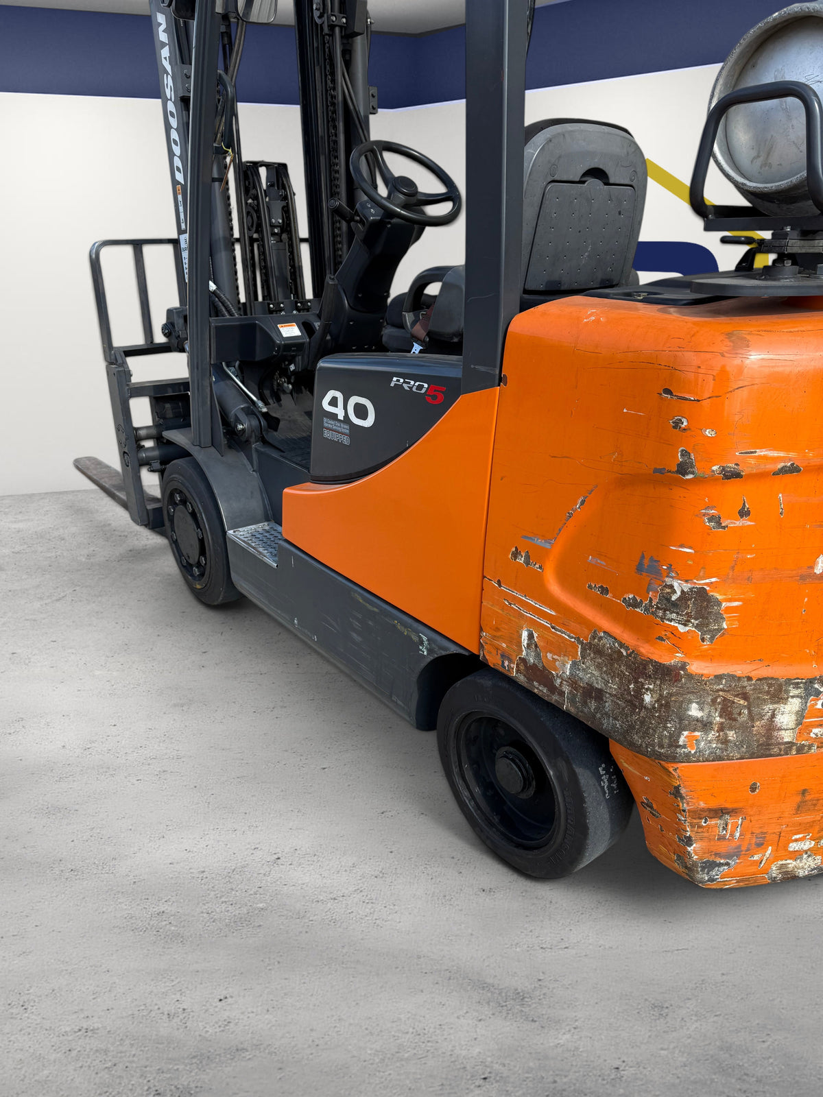 Burwell Material Handling 2019 Doosan GC40S-5 forklift with triple mast, sideshifting forkpositioner, and new tires.