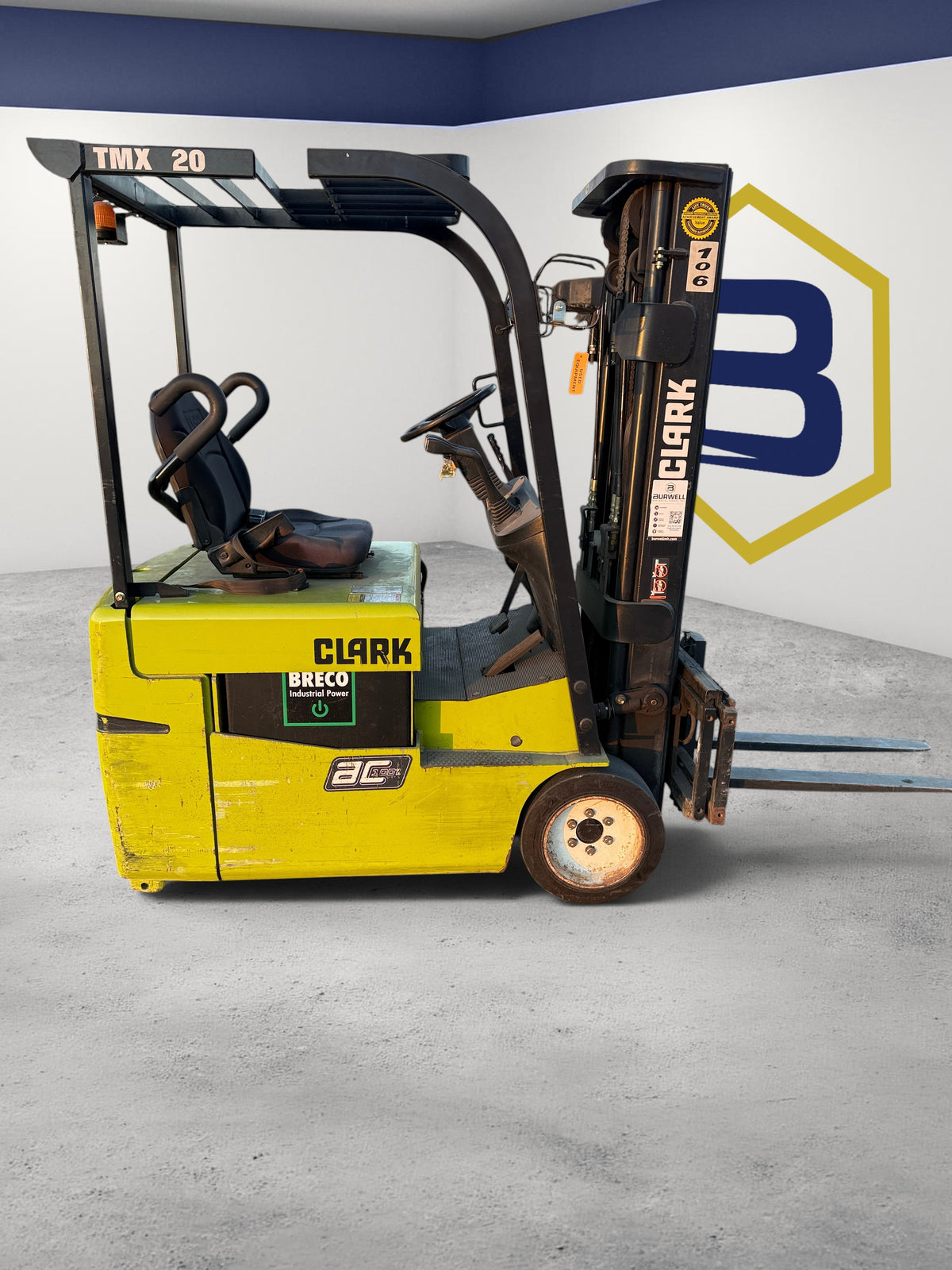 Burwell Material Handling 2014 Clark TMX20 electric sit-down forklift with yellow body and triple-stage mast