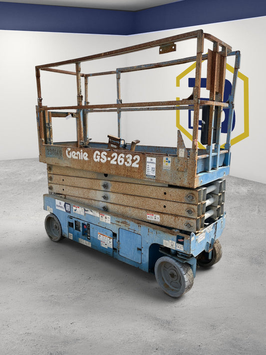 Burwell Material Handling 2014 Genie GS-2632 electric scissor lift with blue frame and weathered steel platform