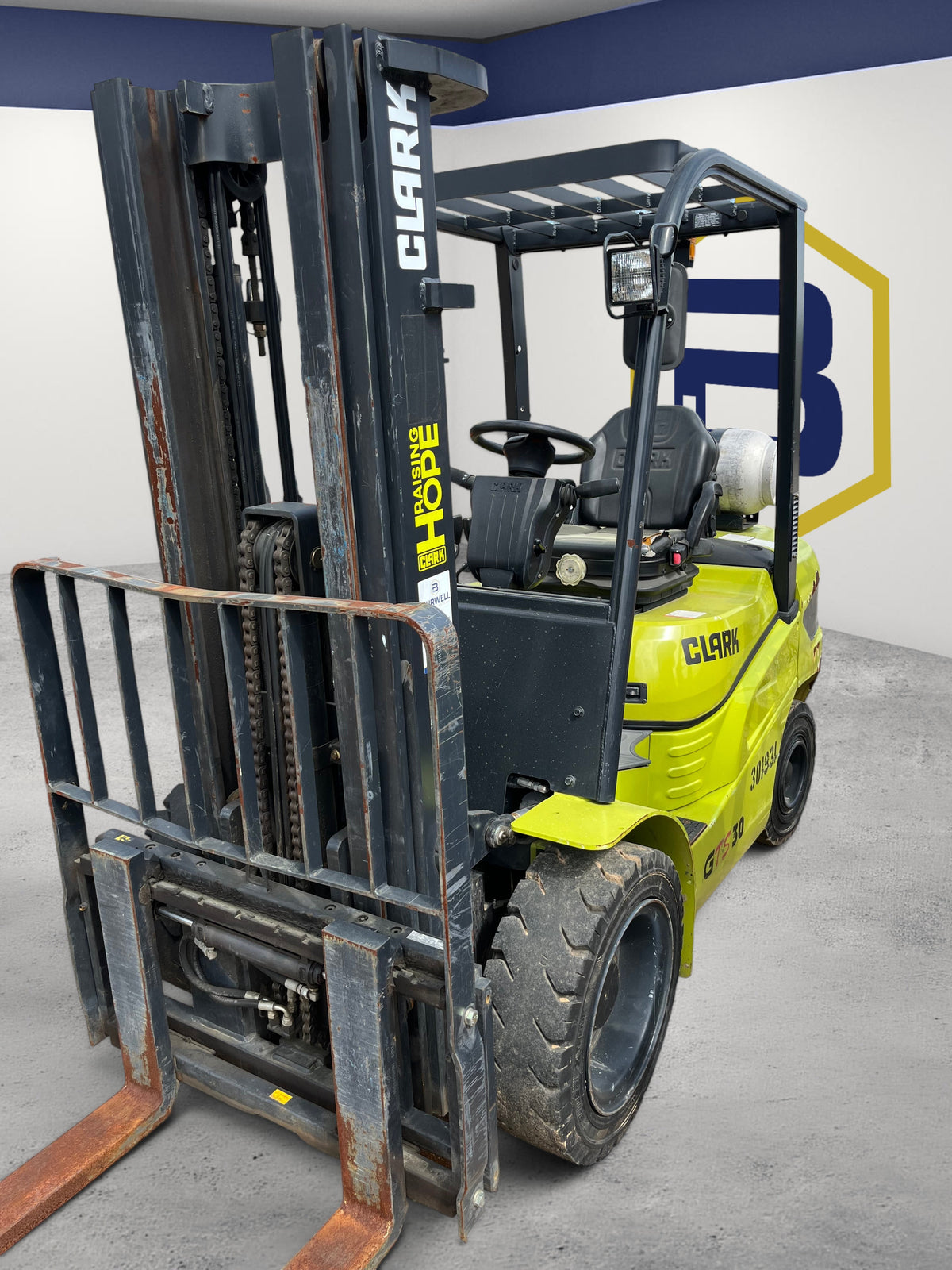 Burwell Material Handling 2022 CLARK GTS30 pneumatic tire forklift in lime green and black for outdoor industrial use.