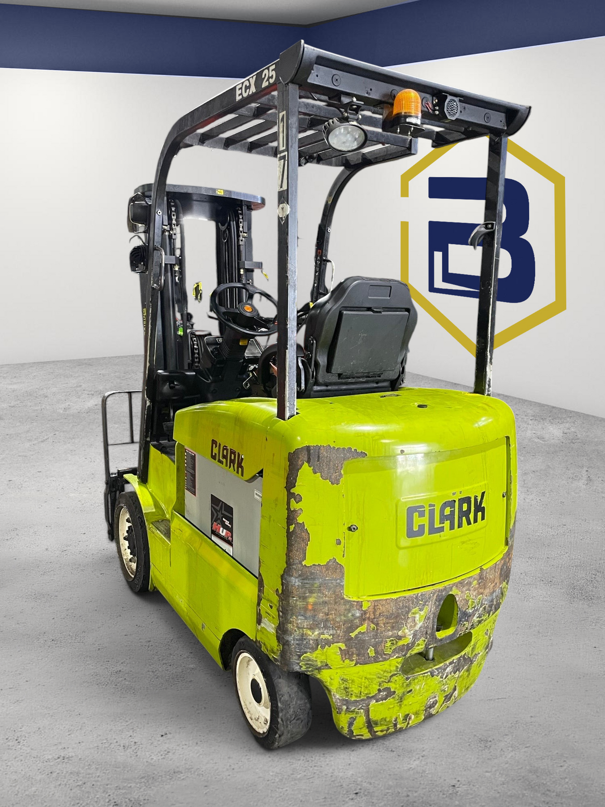 Burwell Material Handling used CLARK ECX25 electric sit-down forklift with lime green chassis in a warehouse