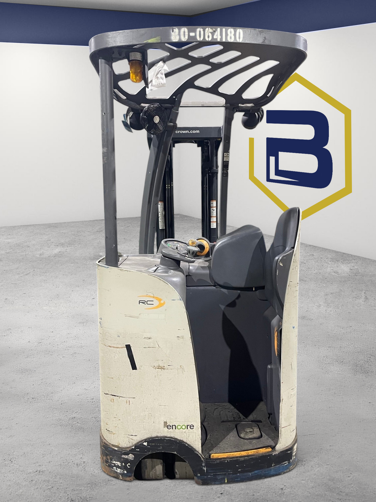 Burwell Material Handling 2010 Crown RC5545-40 electric stand-up forklift in a warehouse setting.
