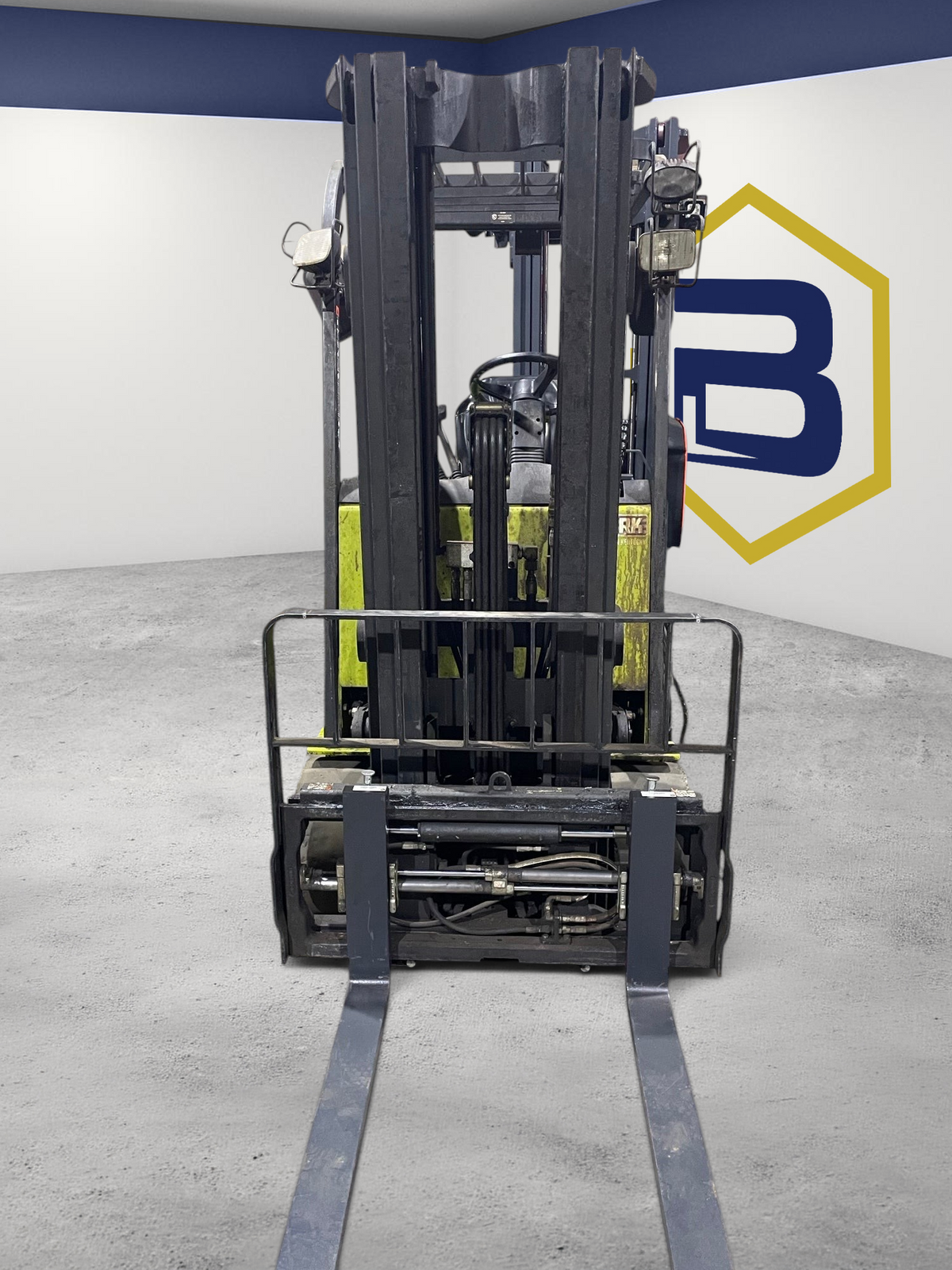 Burwell Material Handling Clark TMX25 3-wheel electric forklift with cushion tires in a warehouse setting