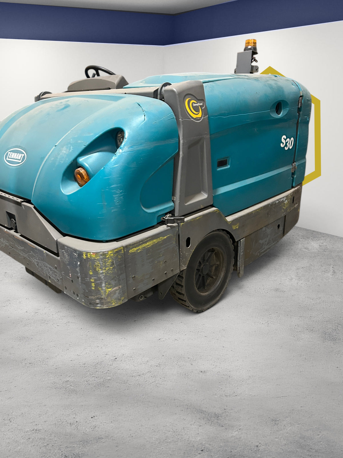 Burwell Material Handling 2000 Tennant S30 industrial rider sweeper in teal with heavy-duty steel frame.