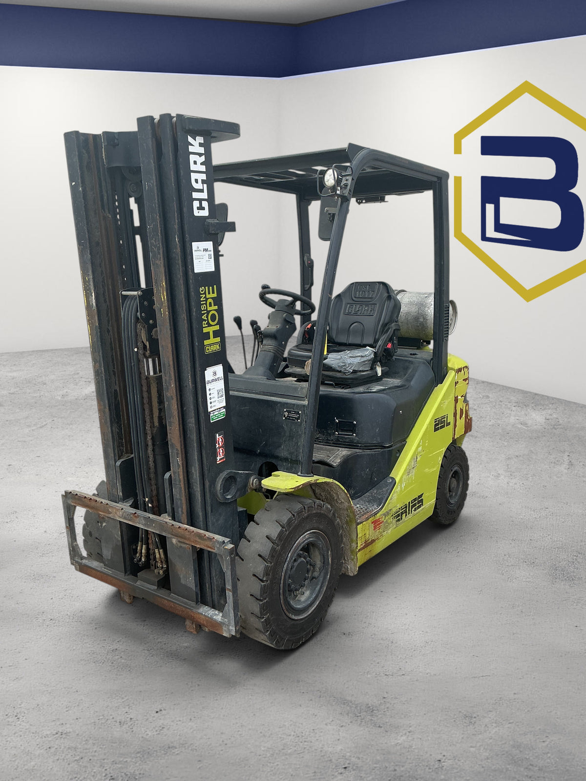 Burwell Material Handling 2014 CLARK S25 pneumatic tire forklift with a triple-stage mast in green and black