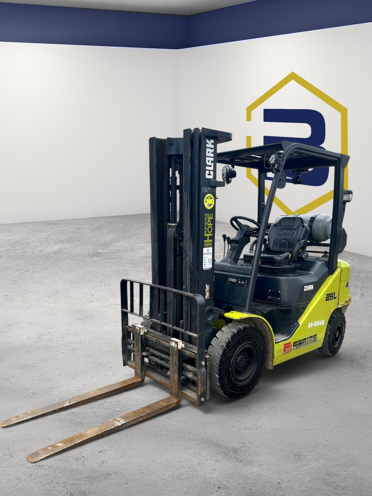 Burwell Material Handling 2020 CLARK S25 LPG pneumatic-tire forklift with a triple-stage mast in a studio setting.