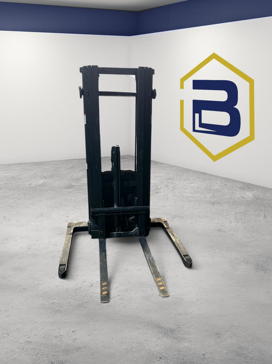 Burwell Material Handling Crown ST3000-20 electric straddle stacker forklift in a warehouse setting.