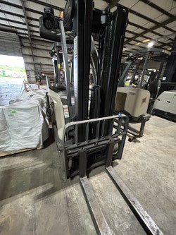 Burwell Material Handling 2011 Crown RC5545-40 stand-up reach forklift in a warehouse setting