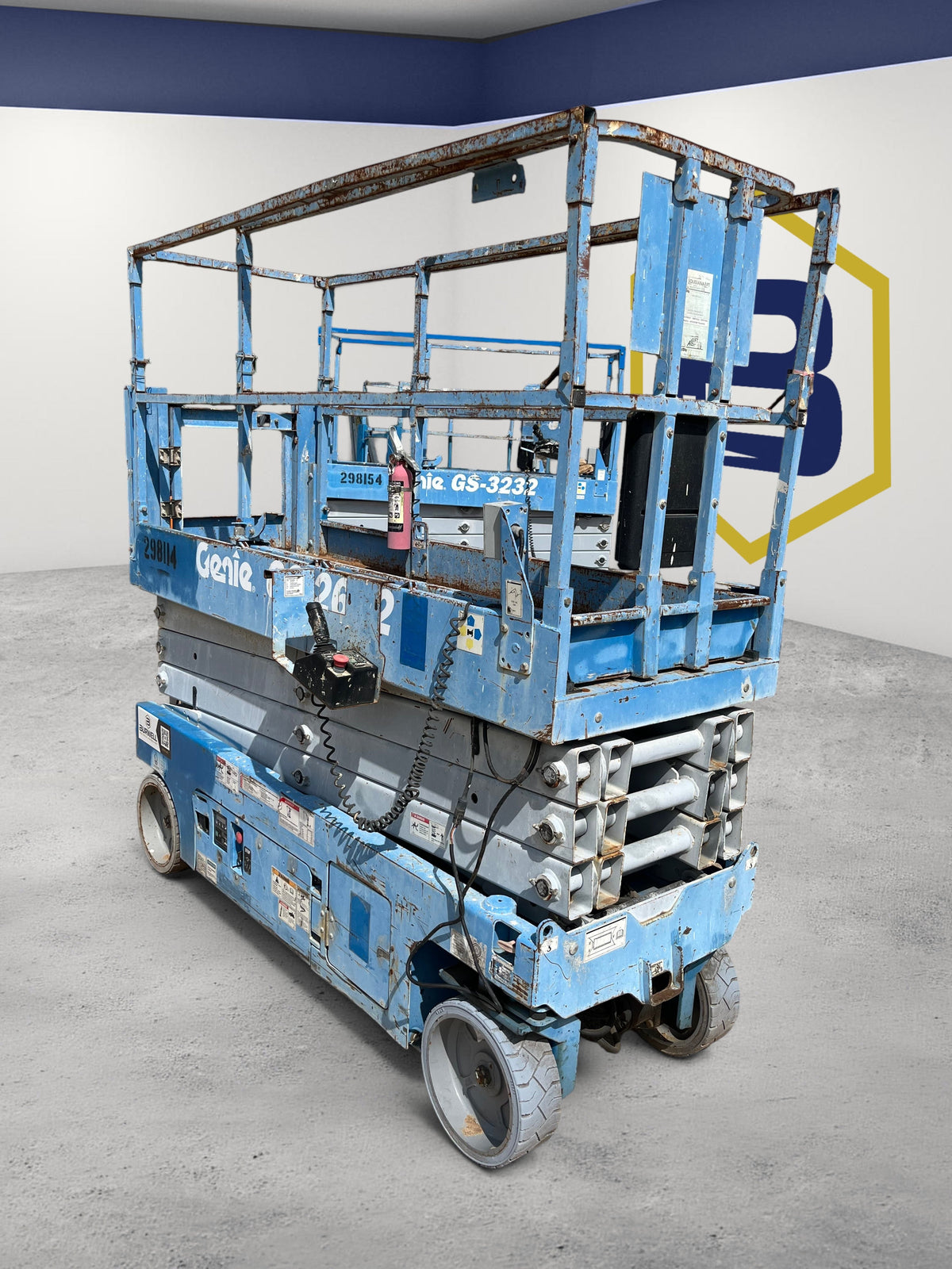 Burwell Material Handling 2013 Genie GS2632 electric scissor lift with blue metal frame and 26 ft platform height