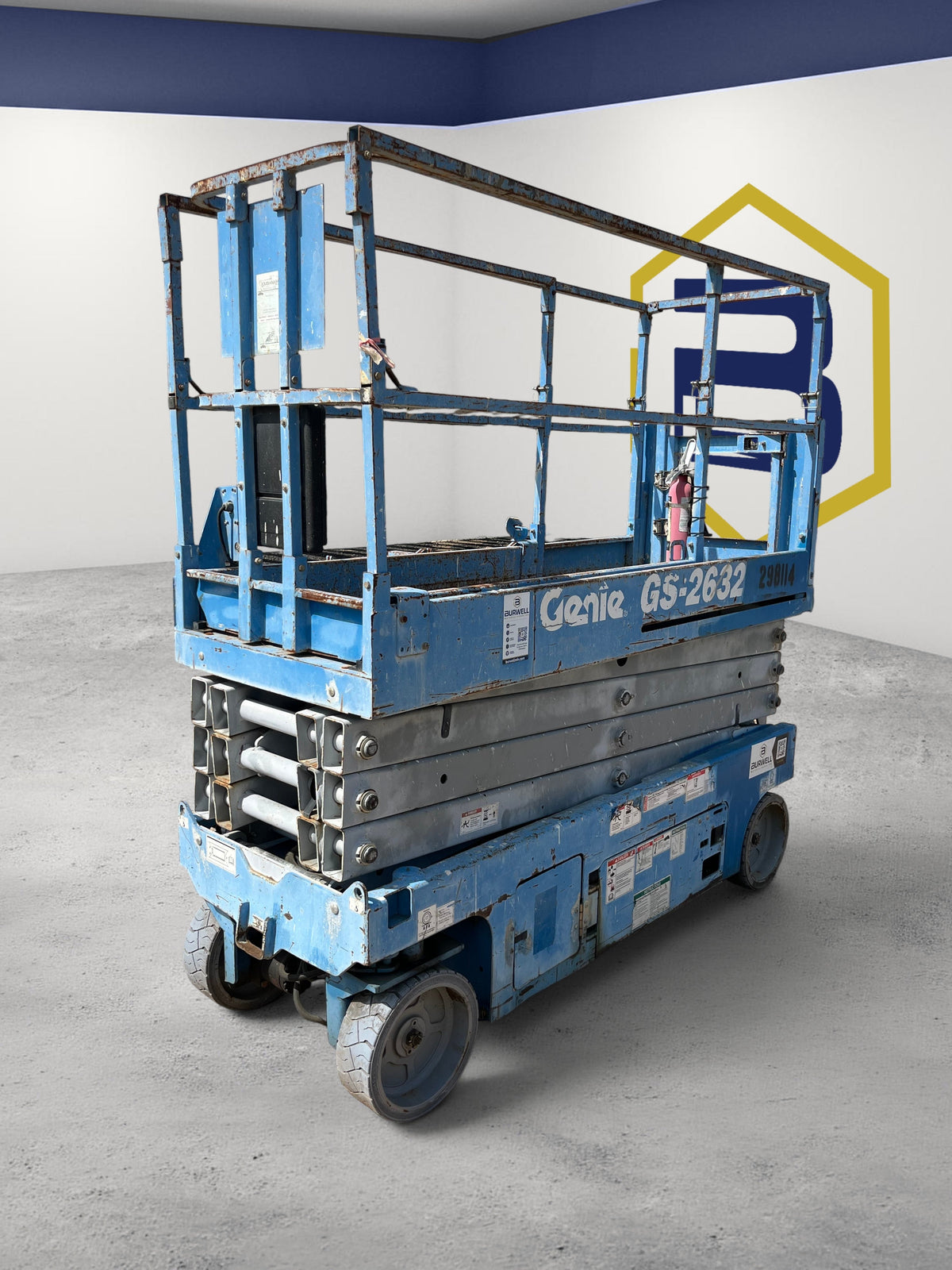 Burwell Material Handling 2013 Genie GS-2632 electric scissor lift in blue, featuring a 26 ft platform height.
