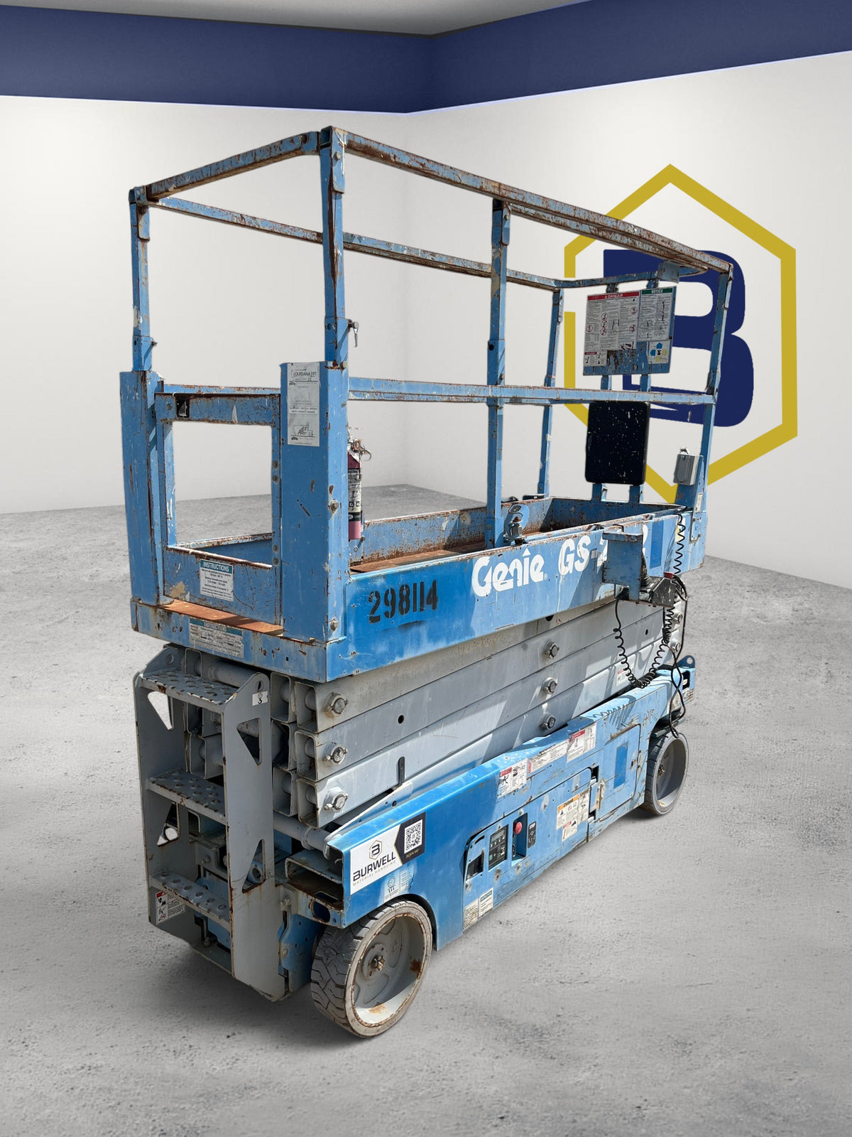 Burwell Material Handling 2013 Genie GS2632 electric scissor lift with blue chassis and 26 ft platform height