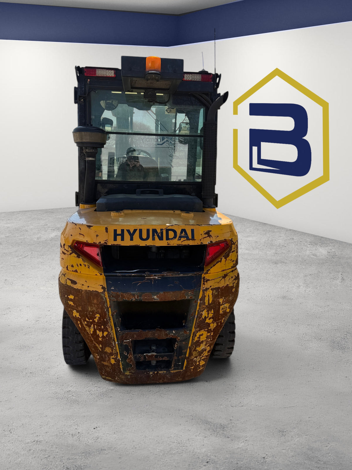 Burwell Material Handling 2019 Hyundai 50DA-9F diesel pneumatic forklift, rear view showing yellow industrial chassis.