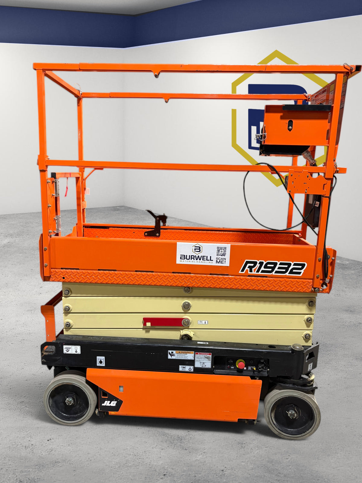 Burwell Material Handling 2022 JLG R1932 electric scissor lift with orange and beige frame in indoor setting