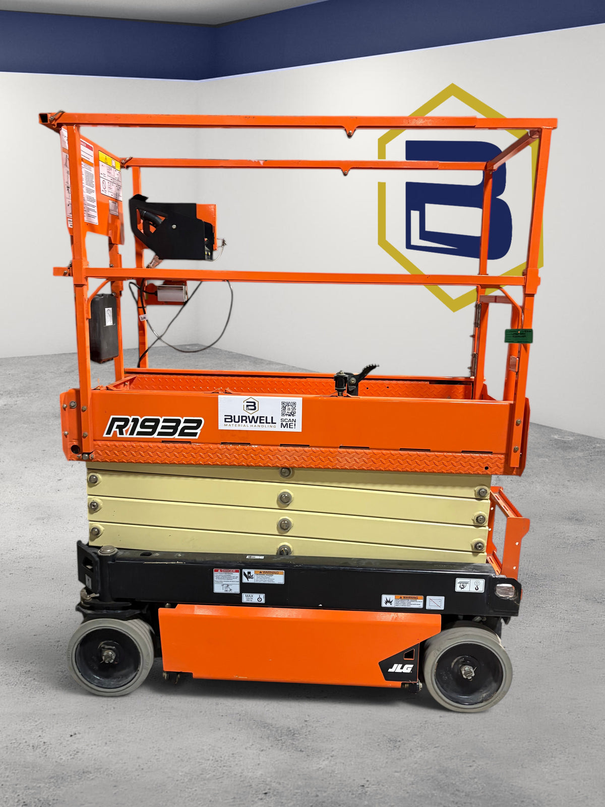 Burwell Material Handling 2022 JLG R1932 electric scissor lift with orange frame and 19 ft platform height
