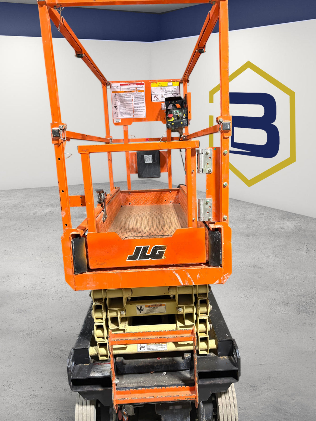 Burwell Material Handling 2022 JLG R1932 electric scissor lift with orange platform and compact chassis