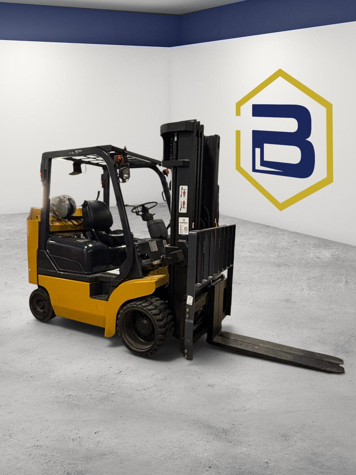 Burwell Material Handling 2001 Komatsu FG45BCS-7 cushion-tire LPG forklift for indoor industrial material handling.