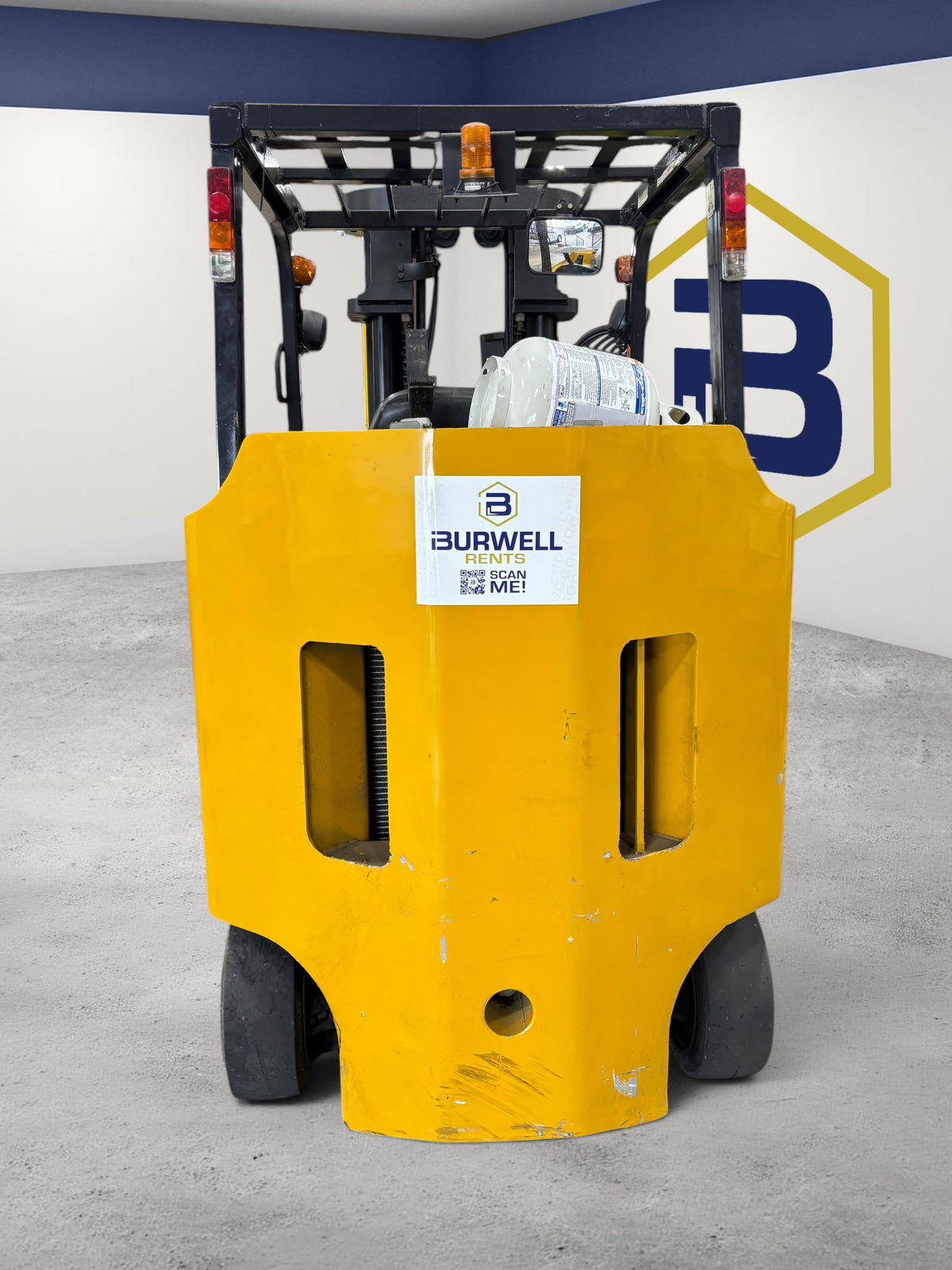 Burwell Material Handling 2001 Komatsu FG45BCS-7 yellow cushion-tire forklift with LPG tank, rear view