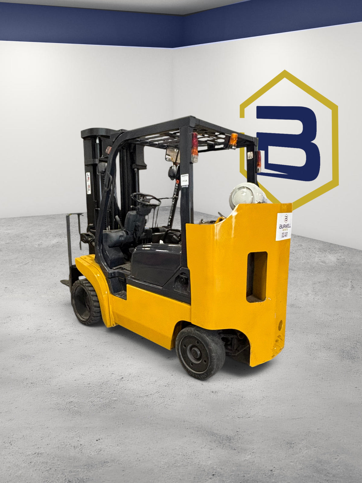 Burwell Material Handling 2001 Komatsu FG45BCS-7 yellow cushion-tire forklift for indoor industrial use