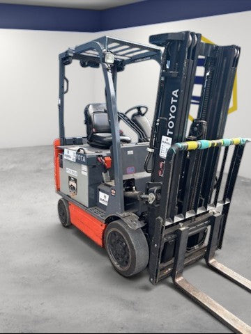 Burwell Material Handling 2022 Toyota 8FBCU25 electric cushion forklift with 5,000 lb capacity in a warehouse setting.