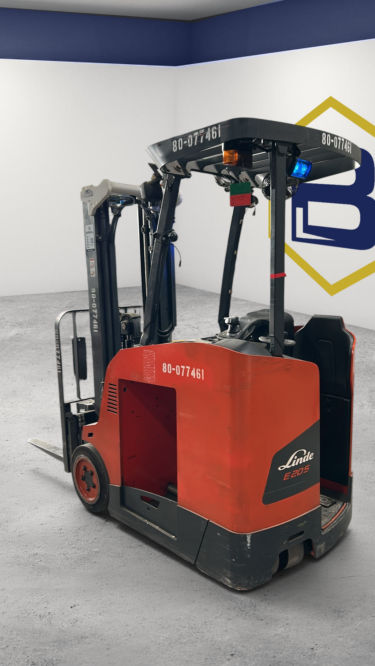 Burwell Material Handling red Linde E20S electric stand-up forklift in a warehouse setting