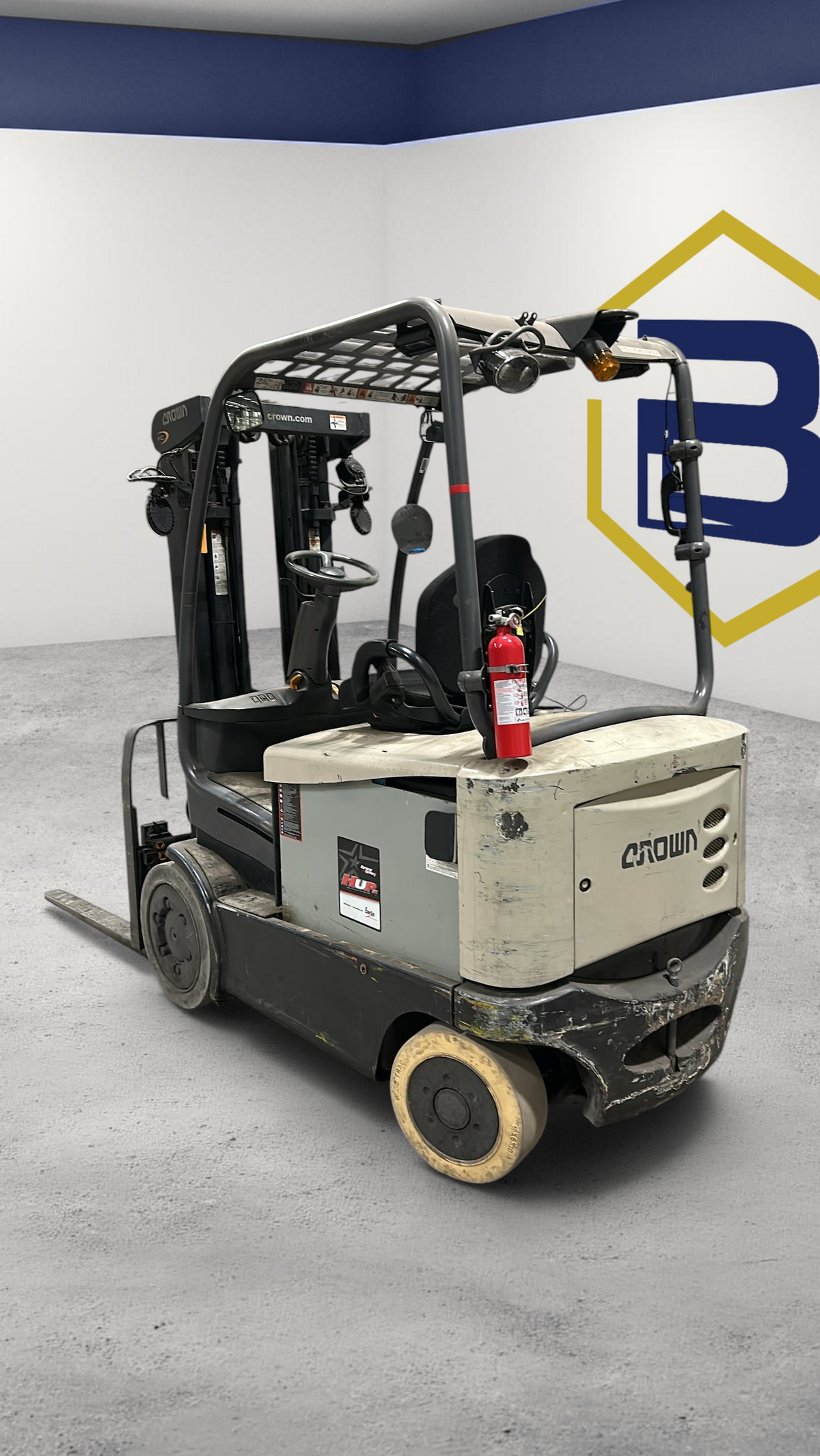 Burwell Material Handling used 2017 Crown FC5225-50 electric sit-down counterbalance forklift in a warehouse setting.
