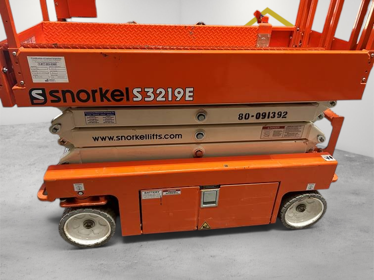 Burwell Material Handling 2022 Snorkel S3219E electric scissor lift in orange, featuring a compact narrow chassis.